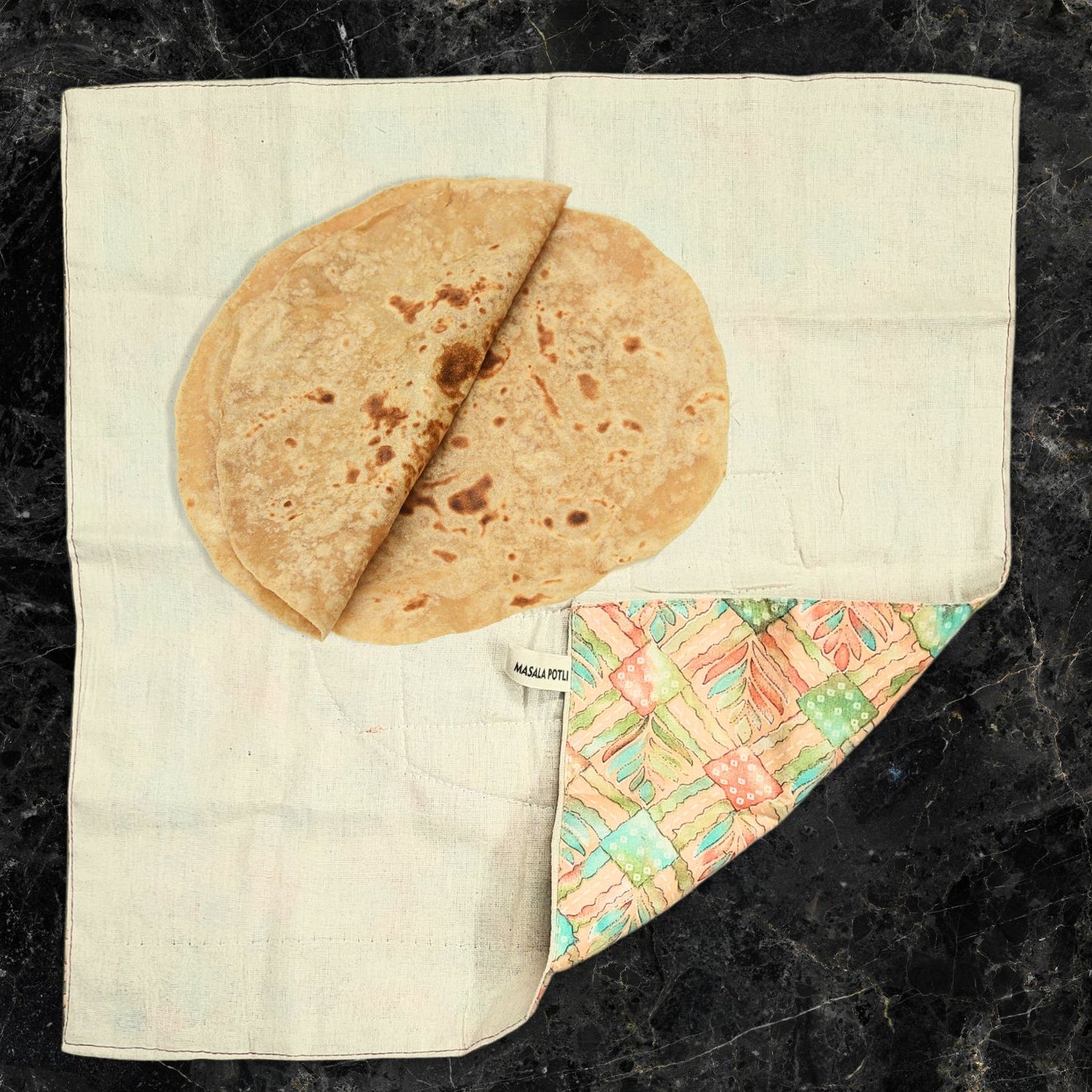 a sandwich sitting on top of a piece of paper
